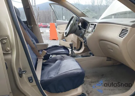 2006 Kia Rio Lx z USA, uszkodzony, nr VIN KNADE123266171027